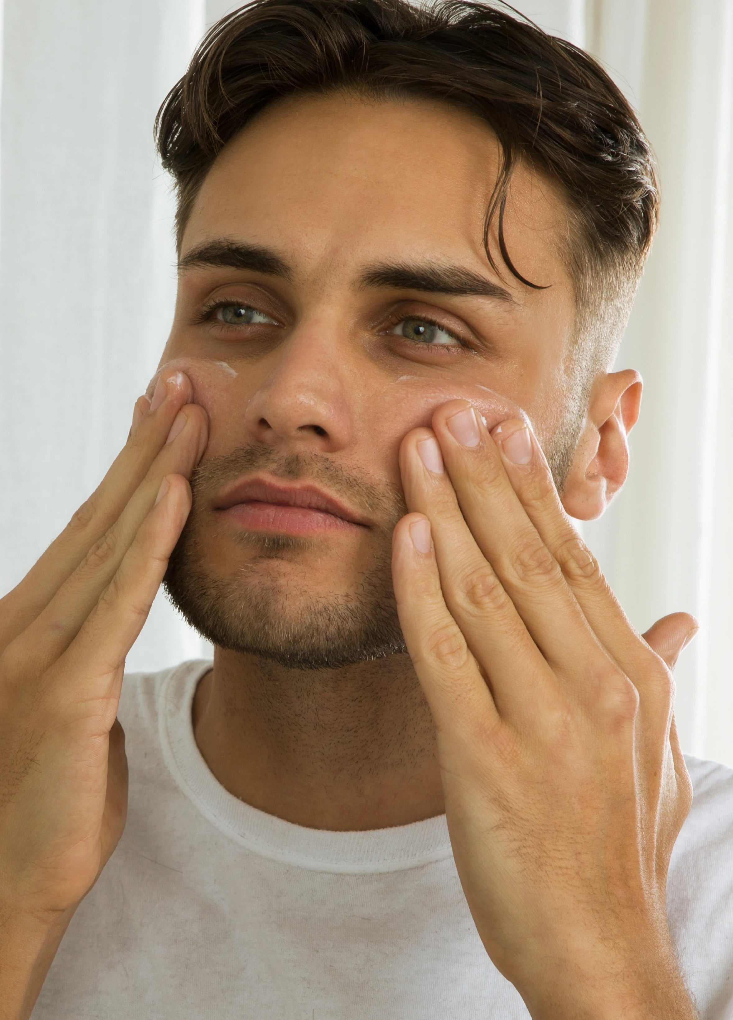 Man using Imperial Scruff Peptide Moisturizer