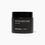Black jar of peptide moisturizer with 'Imperial Scruff' branding on a white background